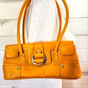 Franco Sarto brand, lined, deep mustard handbag.